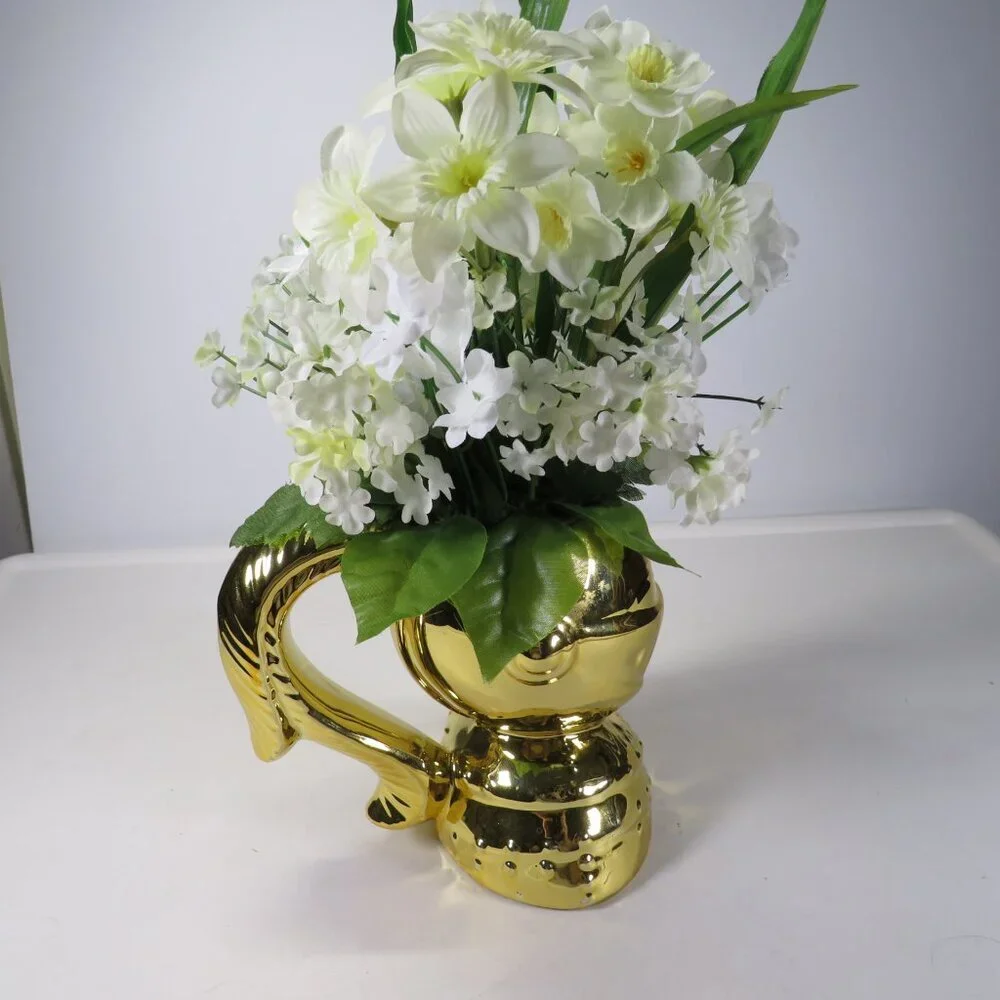 Gold Knight in Shining Armor with White Flowers